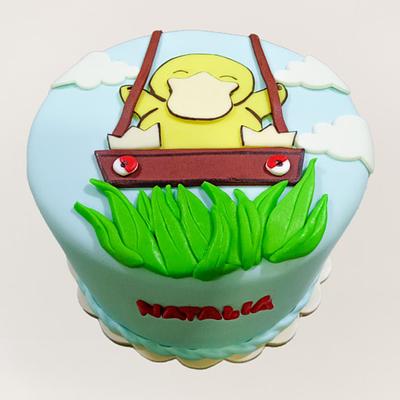 Torta Psyduck feliz en columpio