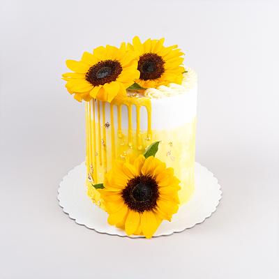 Torta alta con girasoles