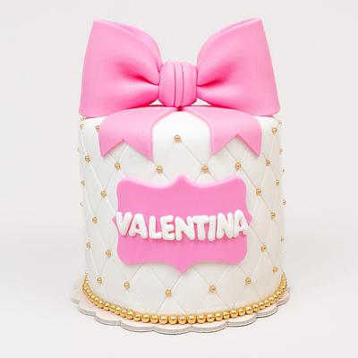 Torta femenina con moño